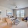 Living Room With Couch, Chair and Sideboard