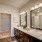 Bathroom with Espresso Cabinets and Double Sinks